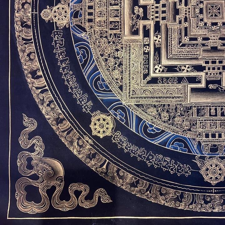 Close-up of fine gold linework on the Kalachakra mandala.